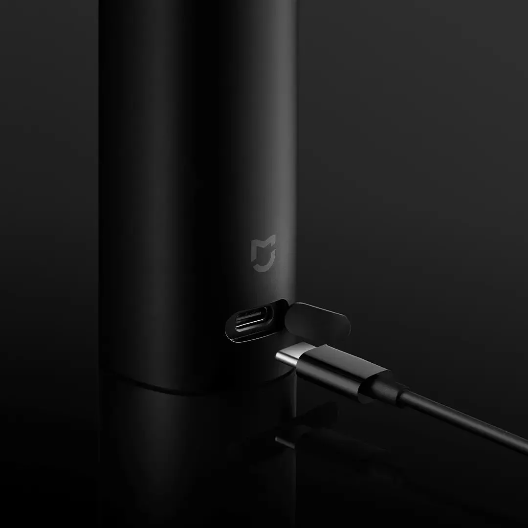 Black full body rechargeable portable razor